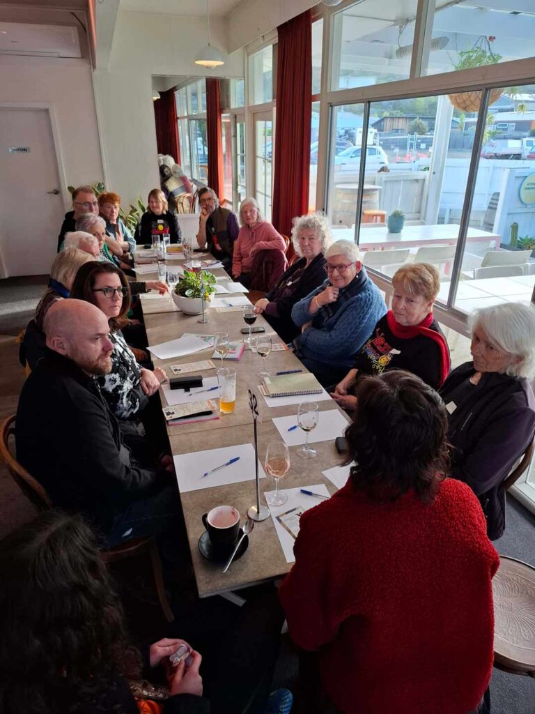 A photo of a gathering in Kingborough to mark the first anniversary of the Voice referendum.